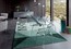 Обеденный стол из гнутого стекла Roche Bobois Agape Dining Table