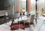 Невесомый стол-трансформер Roche Bobois Echoes Dining Table With Extension Leaf